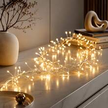 Christmas Halloween Warm Color Solar Powered Firecracker Fairy String Lights, Available In 5M100LED, 8M200LED, 11M300LED Multiple Sizes To Choose From. The Clustered Light Beads Simulate The Shape Of Firecrackers, With A Tight And Three-Dimensional Arrangement. When Lit, The Soft Warm Light Spreads And Radiates, Creating A Strong Atmosphere Like Scattered Starlight On Earth. Solar Energy Storage Design, Absorbing Sunlight During The Day To Store Power - Solar Firecracker String Lights - View 5
