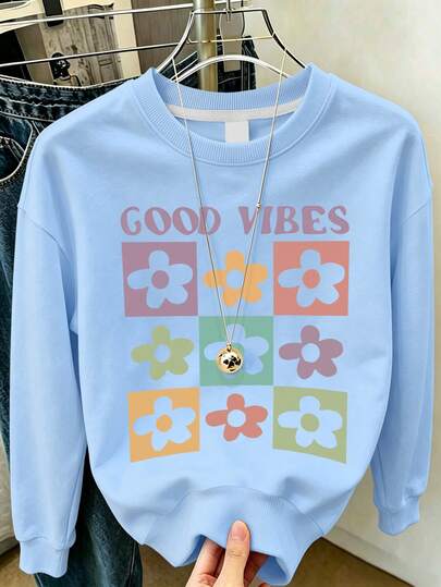 Sudadera de cuello redondo azul claro para niñas preadolescentes, GOOD VIBES & Top holgado tipo pullover con flores a cuadros coloridos