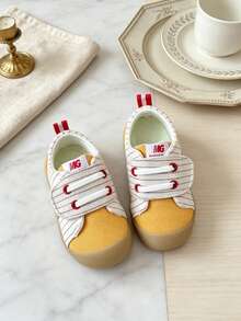 Toddler Striped Patchwork Kids' Sports Shoes, Soft Upper Fits Foot Shape, Wide Toe Design, Low-Top Style With Hook And Loop Closure, Red Pull Tab On Heel, Retro Casual Walking Shoes, Suitable For Kindergarten Activities, Weekend Outings, Holiday Trips, Improves Difficulty Of Putting On Shoes And Breathability Issues - Yellow - View 1