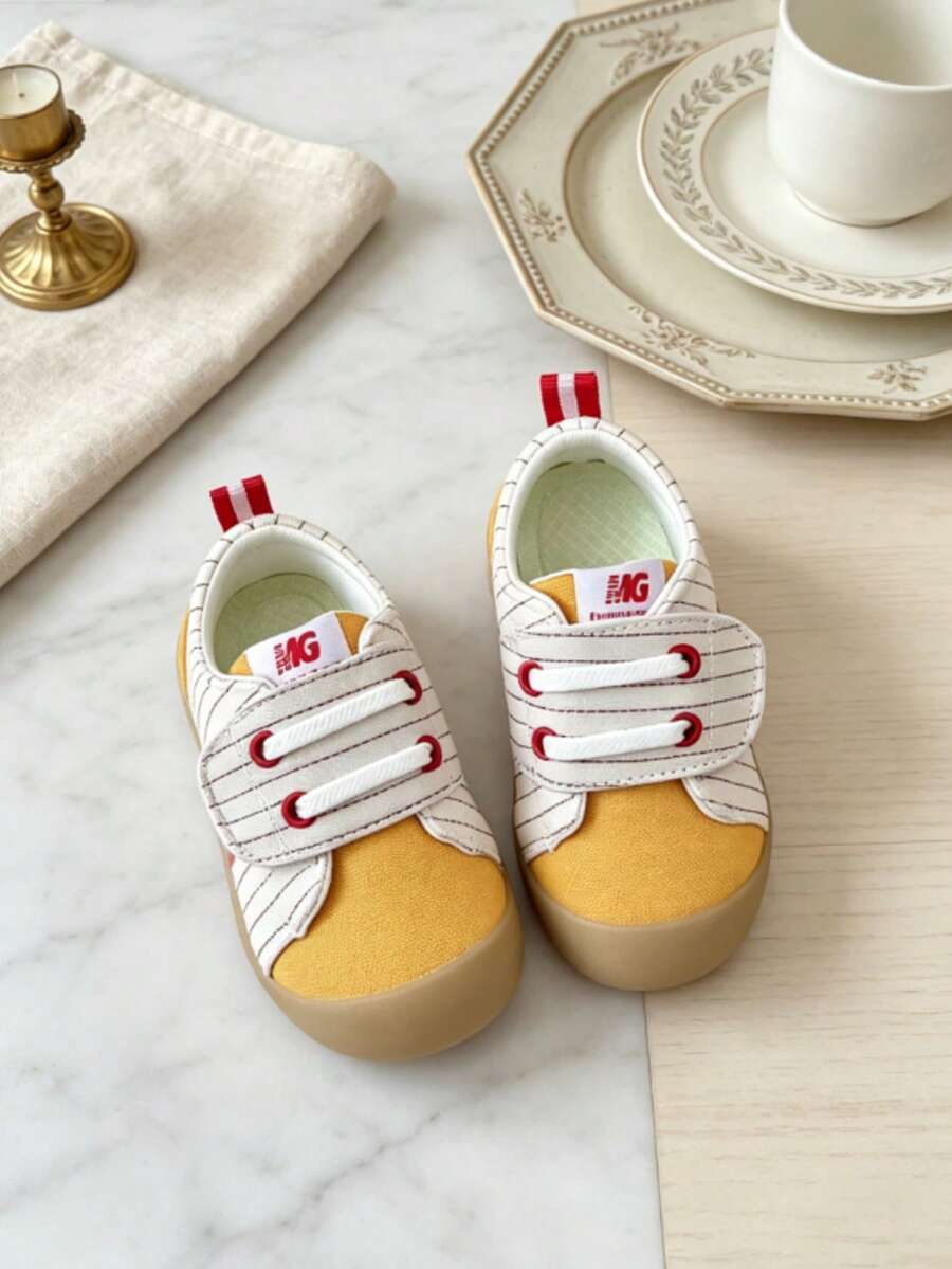 Toddler Striped Patchwork Kids' Sports Shoes, Soft Upper Fits Foot Shape, Wide Toe Design, Low-Top Style With Hook And Loop Closure, Red Pull Tab On Heel, Retro Casual Walking Shoes, Suitable For Kindergarten Activities, Weekend Outings, Holiday Trips, Improves Difficulty Of Putting On Shoes And Breathability Issues - Yellow - View 1