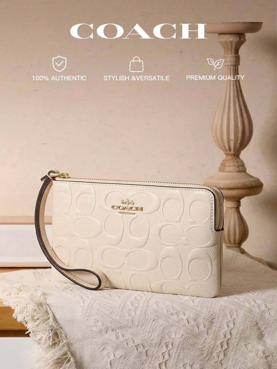 Coach Iconic 帆布條紋圓弧拉鍊手拿包