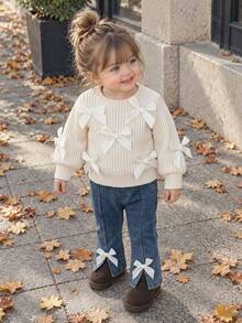 Baby Girl Gentle Cream Color 2-Piece Set, Multiple 3D Satin White Bow Round Neck Long Sleeve Pullover Knit Top + Light Blue Denim Flare Pants With Front Slit And Bow Decor - Apricot - View 2