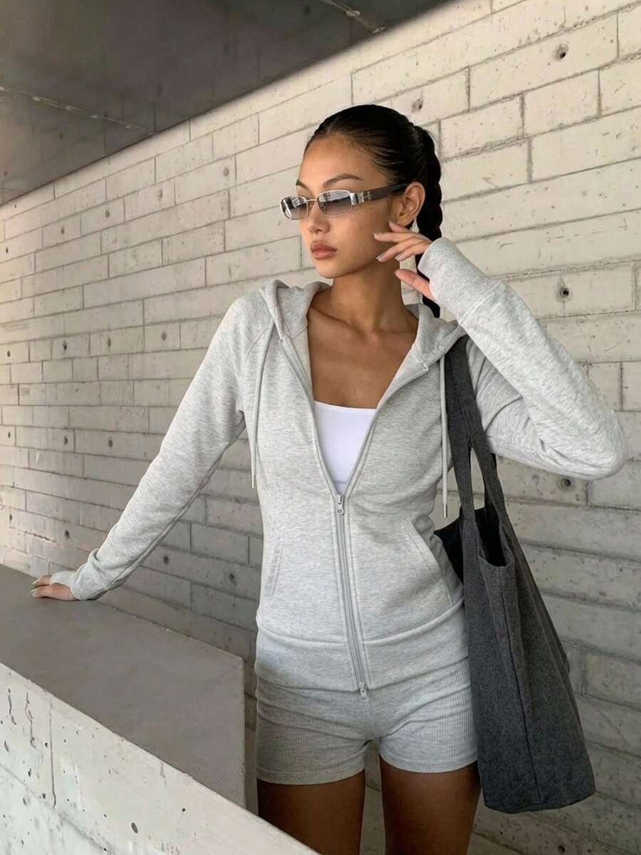بلوزة رياضية نسائية كاجوال بتصميم بسيط وقصة ضيقة مع سحاب وجيوب برباط، مناسبة لجميع الفصول الربيع والصيف والخريف والشتاء