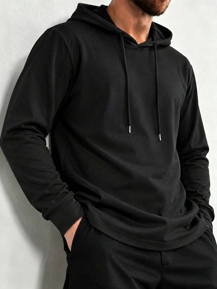 Men's Solid Color Basic Hoodie T-Shirt, Minimalist Black Drawstring Hooded Long Sleeve Pullover T-Shirt, Casual Everyday Layering Top - Black - View 1