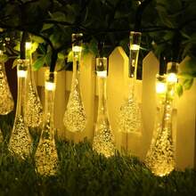 Atmospheric Warm Light Solar Water Drop String Lights, Available In 5M20LEDs, 7M50LEDs, 12M100LEDs, Crystal Clear Water Drop Pendant With Transparent Design, Warm Light Penetrating Water Drop Shell, Soft And Gentle Light Effect, Fresh And Natural Visual Experience. Solar Powered Design, Collects Sunlight During The Day, Automatically Lights Up At Night, No Wiring Required, Easy Installation, Just Hang It Up. Multiple Lighting Modes For Customization - Solar Water Drop String Lights - View 12