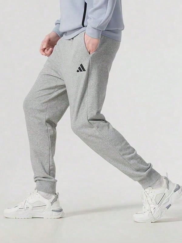 Adidas Men's Spring 2026 New Casual Sports Tapered Sweatpants, Comfortable JE3855 - Grey - View 1