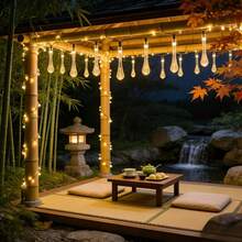 Warm Light Solar Water Drop String Lights, Available In 5M20LEDs, 7M50LEDs, 12M100LEDs Three Sizes, Exquisite Transparent Water Drop Shape, Warm Light Radiates From Inside The Water Drops, Soft Light Diffuses, Elegant And Fresh Style. Solar Powered, Automatically Stores Sunlight Energy During The Day, Automatically Turns On At Night, No External Power Supply Needed, Eliminates Wiring Hassle, Easy Hanging Installation. Multiple Light Dynamic Modes, Soft And Soothing Warm Light - Solar Water Drop String Lights - View 7