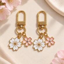 1pc/2pcs Women's Alloy Oil-Drip Color-Changing Sakura Pendant Pink Rhinestone Sakura Accessory Keychain, INS Style Earphone Case Decoration, Bag Charm - Multicolor - View 5