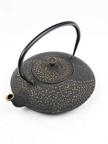A Japanese-Style Cast Iron Teapot, Suitable For Brewing Tea Over A Fireplace, Perfect For Home Use As A Tea Set. It Features An Open Flame And A Handle, And Comes In Various Textured Designs. Sizes Range From 780-1200ml. - Iron Teapot With Gold Cherry Blossom Pattern - View 3