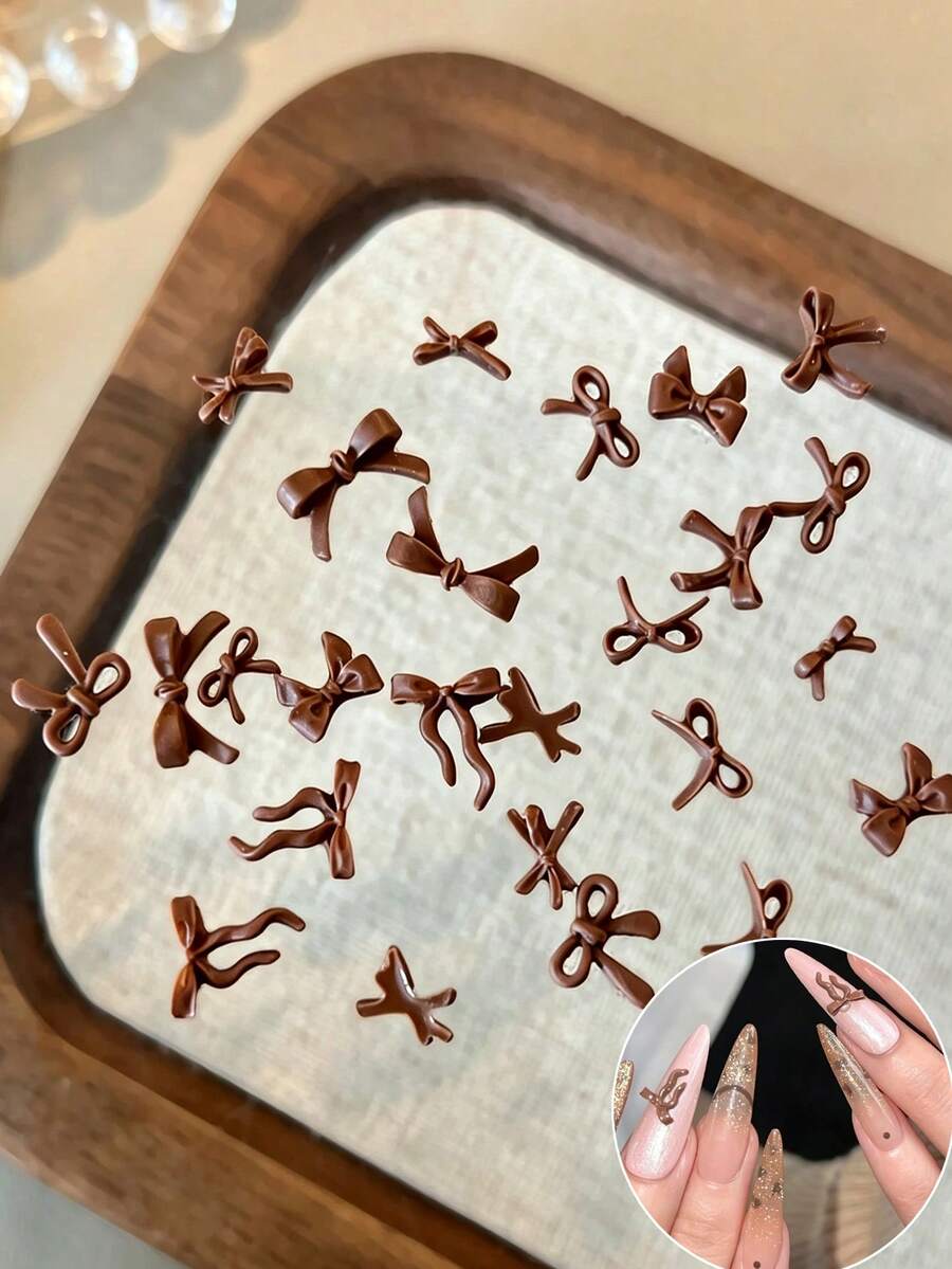 100pcs Solid Matte Brown 3D Ribbon Nail Art Decorations, Mixed Resin Bows In Various Shapes, Autumn/Winter Mini Ribbon Nail Accessories, DIY Nail Design, Nail Supplies - Brown - View 1