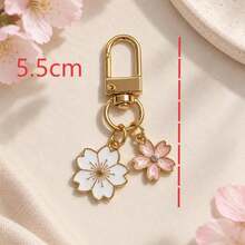 1pc/2pcs Women's Alloy Oil-Drip Color-Changing Sakura Pendant Pink Rhinestone Sakura Accessory Keychain, INS Style Earphone Case Decoration, Bag Charm - Multicolor - View 4
