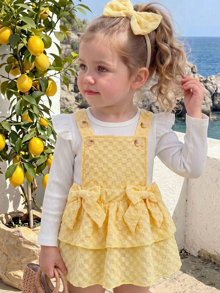 Baby Girl Gentle Princess 3-Piece Outfit Set: Ruffle Flutter Sleeve Ribbed Long Sleeve Inner Top + Double-Sided 3D Big Bow Decor Plaid Double Layer Cake Bustier Strap Dress + Matching Same Color Bow Hair Accessory Set - Yellow - View 1