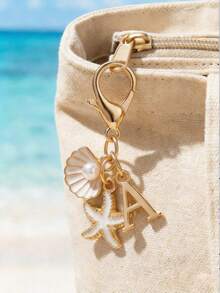 Llavero de letra dorada estilo bohemio, decoración de concha & estrella de mar, accesorio de vacaciones en la playa con letras A-Z, adecuado para mochila, billetera, colgante de bolso - Multicolor - Ver 3
