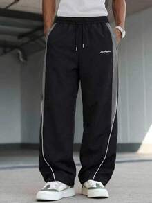 Black & Grey Colorblock Techwear Cargo Pants For Men, Elastic Drawstring Waist, White Trim Hem Design, Small Logo Print, Loose Straight Leg Wide Leg Pants, Versatile For Daily Wear And Sports, Unisex - Black - View 3