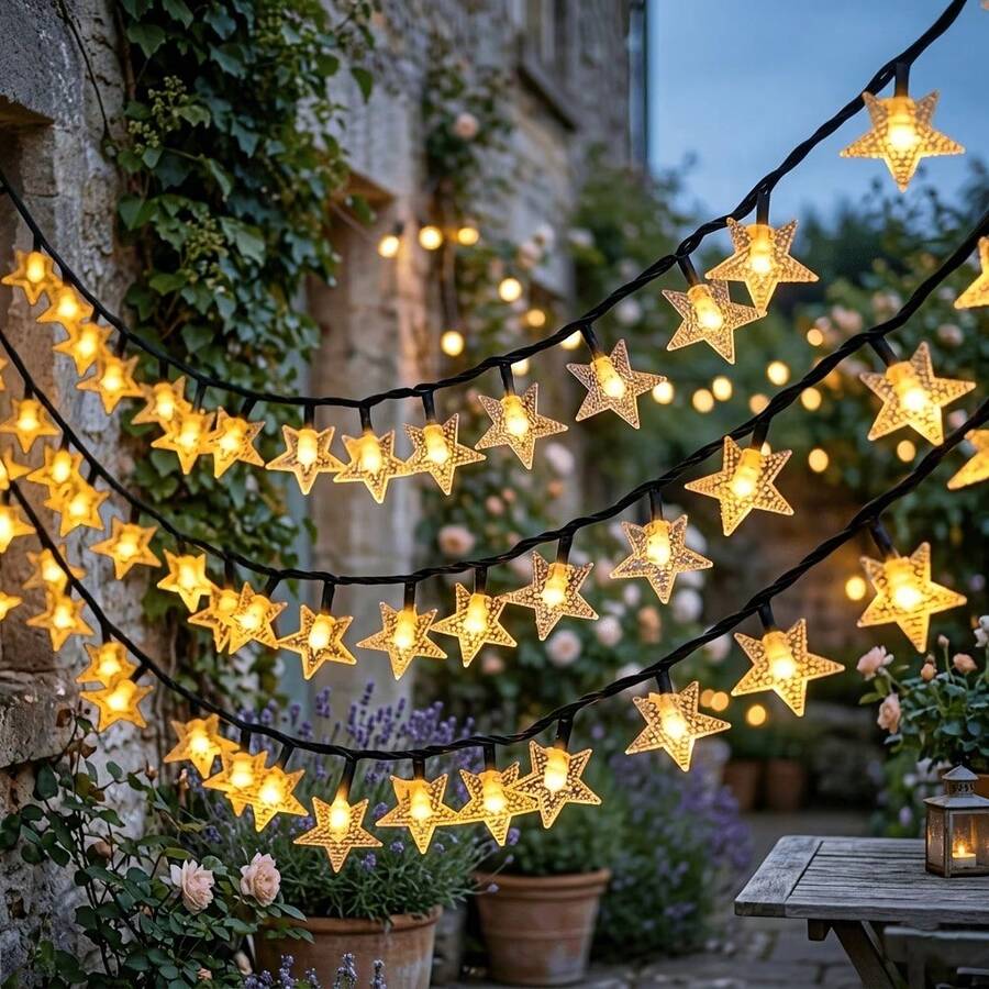 Create An Outdoor Starlit Night Scene With This Solar Star String Light, Available In 5M20LED, 7M50LED, 12M100LED Three Specifications, Soft Warm Light Is Gentle And Touching. Hollow Five-Pointed Star Design With Delicate Texture, Stars Arranged In A Staggered Pattern, Lighting Up With Soft And Misty Light And Shadow, As If The Starry Sky Fell Into The Courtyard. Comes With 8 Light Dynamic Modes, Constant, Flashing And Other Effects Can Be Freely Switched