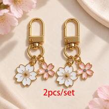 1pc/2pcs Women's Alloy Oil-Drip Color-Changing Sakura Pendant Pink Rhinestone Sakura Accessory Keychain, INS Style Earphone Case Decoration, Bag Charm - Multicolor - View 3