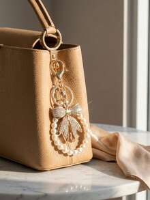 Bow-Knot Keychain Featuring A Faux-Pearl Chain And A Sparkling Bow Charm; Suitable For Handbags, Wallets, And Backpacks-A Stylish Accessory For Women. - Gold - View 7