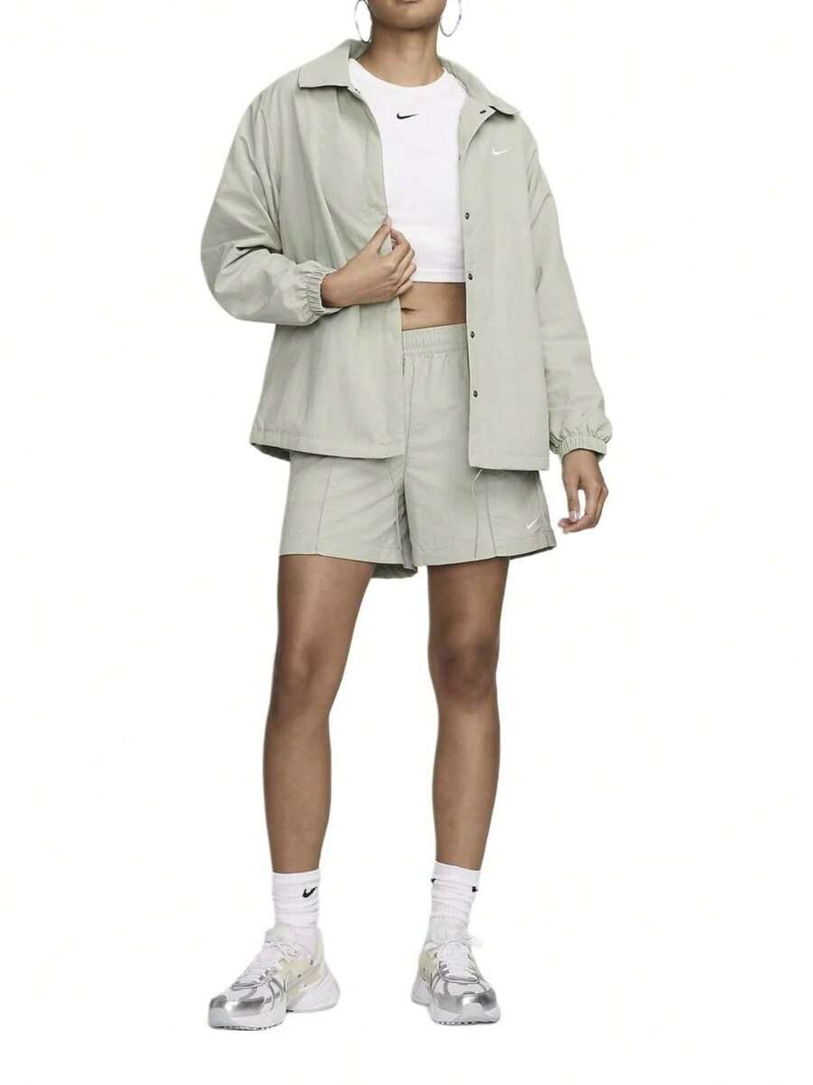 Nike Sportswear Essentials Wanita - Jaket Resleting Serbaguna, Bernapas, dan Melindungi dari Sinar UV - Hijau - View 1