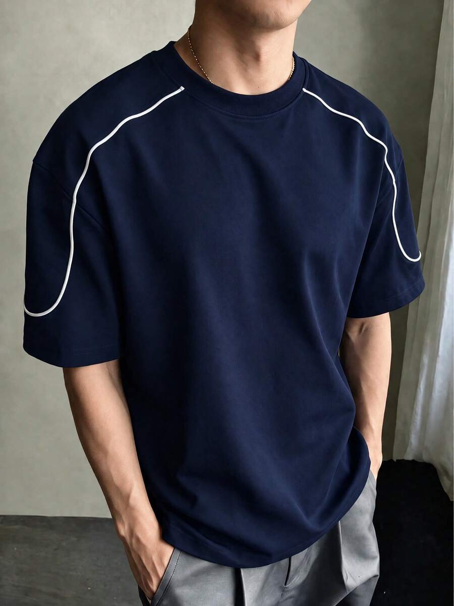 男士夏季美式街頭風海軍藍圓領短袖T恤，白色對比線條插肩袖，寬鬆休閒半袖