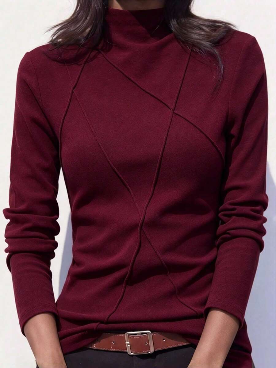 女款半高領保暖內層上衣，秋冬拼接魚骨線條設計