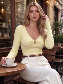DONICY Women's Elegant Ribbed Knit Top, V-Neck Front Twist Metal Decor Fitted Long Sleeve Cropped Blouse - Yellow - View 1