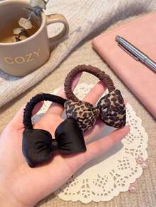 Dây buộc tóc scrunchie nơ họa tiết da báo ngọt ngào, thiết kế co giãn cao, không gây hư tổn tóc, phù hợp buộc tóc đuôi ngựa hàng ngày, đi làm, đi mua sắm, phụ kiện buộc tóc chắc chắn - Nhiều màu - Xem 5