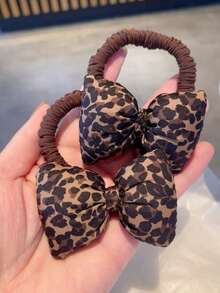 Dây buộc tóc scrunchie nơ họa tiết da báo ngọt ngào, thiết kế co giãn cao, không gây hư tổn tóc, phù hợp buộc tóc đuôi ngựa hàng ngày, đi làm, đi mua sắm, phụ kiện buộc tóc chắc chắn - Nhiều màu - Xem 2