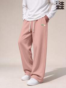mulinsen Men's Solid Color Elastic Waist Wide Leg Sports Pants, Minimalist Label Design, Drawstring Straight Leg Draped Casual Athletic Pants - Pink - View 1