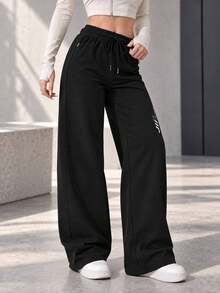 Women's Black Drawstring Jogger Pants With Zipper Pockets And Reflective Detail, Tapered Active Pants For Daily Wear - Black - View 8