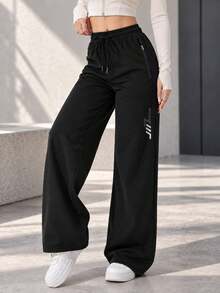 Women's Black Drawstring Jogger Pants With Zipper Pockets And Reflective Detail, Tapered Active Pants For Daily Wear - Black - View 6