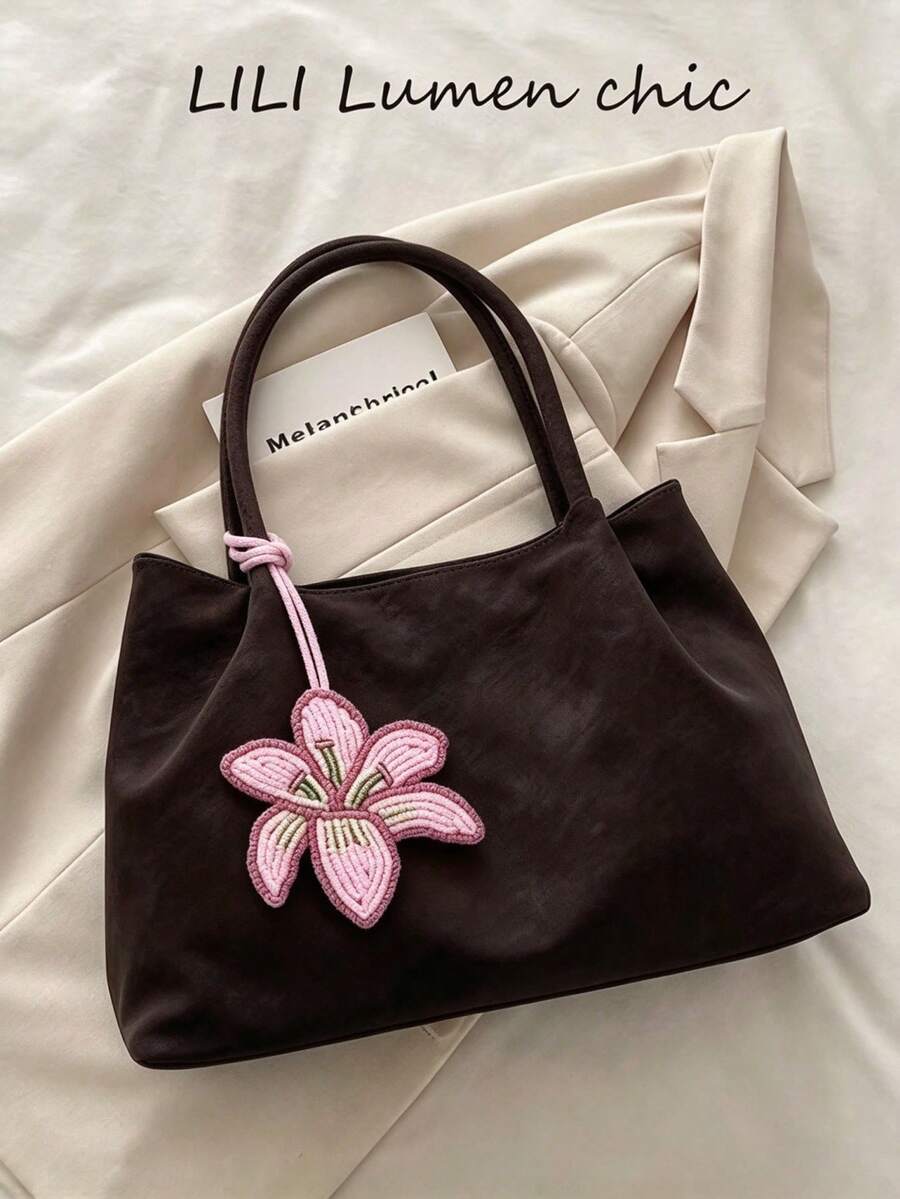 Desain yang lembut dan nyaman, kain lembut yang nyaman disentuh, bodi yang luas untuk menyimpan buku, laptop, dan barang-barang pribadi lainnya. Desain pegangan ganda minimalis, gaya sederhana namun mewah, cocok untuk bepergian dan sekolah, mudah dipadukan dengan berbagai pakaian minimalis. - Coffee Brown - View 1