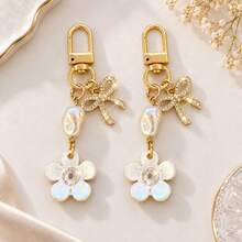 1pc/2pcs Women's French Style High-End Rhinestone Flower Pendant, Asymmetric Beaded Charm, Bowknot Pendant Keychain, Girly Bag Charm, Luggage Accessory - Multicolor - View 1