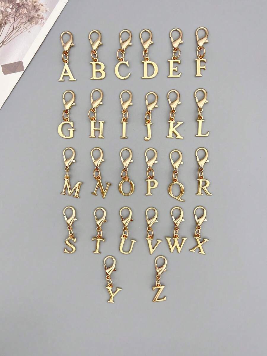 1 مجموعة، قلادة مفاتيح ذهبية صغيرة أنيقة بحروف إنجليزية A-Z، إكسسوار محفظة صغير لطيف، سحر حقيبة DIY، إكسسوار نسائي، قلادة مفاتيح السيارة، ديكور الغرفة، قلادة حقيبة اليد، مناسبة كهدية عالية الجودة للأصدقاء - متعدد الألوان - مشاهدة 1