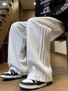 可作為男士禮物，男士休閒運動長褲，寬鬆俐落，適合居家與戶外活動，四季皆可穿著，亦可作為新婚禮物，100% 聚酯纖維材質，附抽繩可輕鬆調節 - 淺灰色 - 查看 1