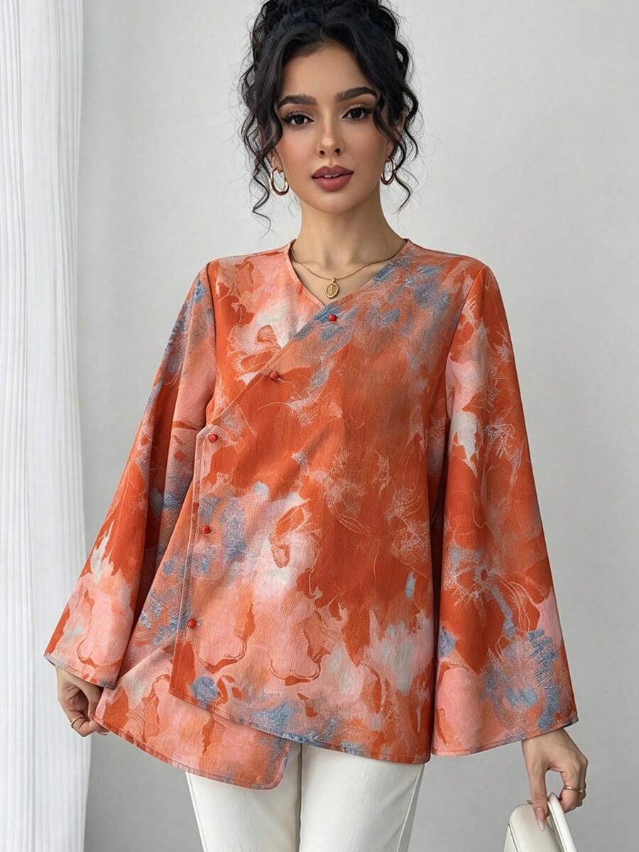 一件女士扎染印花不对称领斜襟单排扣不对称下摆喇叭袖优雅中式衬衫,舒适透气,适合海滩、度假、工作、日常穿着、派对、婚礼和其他场合。 - 亮橙色 - 查看 1