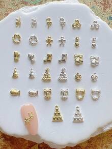 1 gói phụ kiện trang trí nail nghệ thuật mùa đông Giáng Sinh, cây thông, vòng hoa, tuần lộc, chuông, charm nail 3D bằng hợp kim kim loại - Nhiều màu - Xem 1