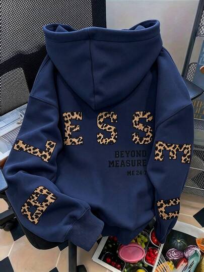 Vexira Women Oversized Leopard Letter Graphic Hoodie, "LESS BEYOND MEASURE" Print Long Sleeve Pullover Sweatshirt, Y2K Streetwear Casual Hooded Top