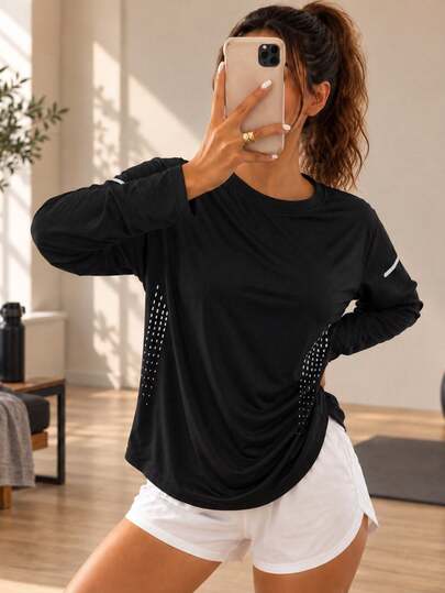 Camiseta de manga larga negra para mujer con paneles laterales transpirables y detalle reflectante en la manga, camiseta de running ajustada
