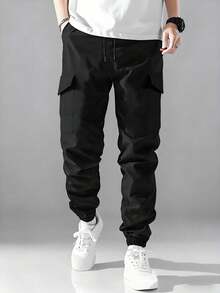 Men's Solid Color Lightweight Minimalist Multi-Pocket Cargo Pants, Fashionable Tapered Leg, Campus Style, Outdoor Hiking Casual Pants - Black - View 1