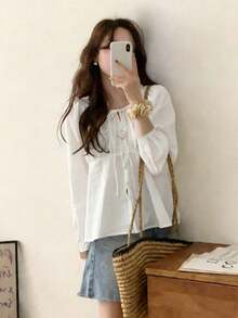 Áo blouse nữ tay dài dáng rộng tôn dáng, cổ tròn đính nơ, cài nút đơn, phong cách độc đáo, dễ phối đồ - trắng - Xem 3