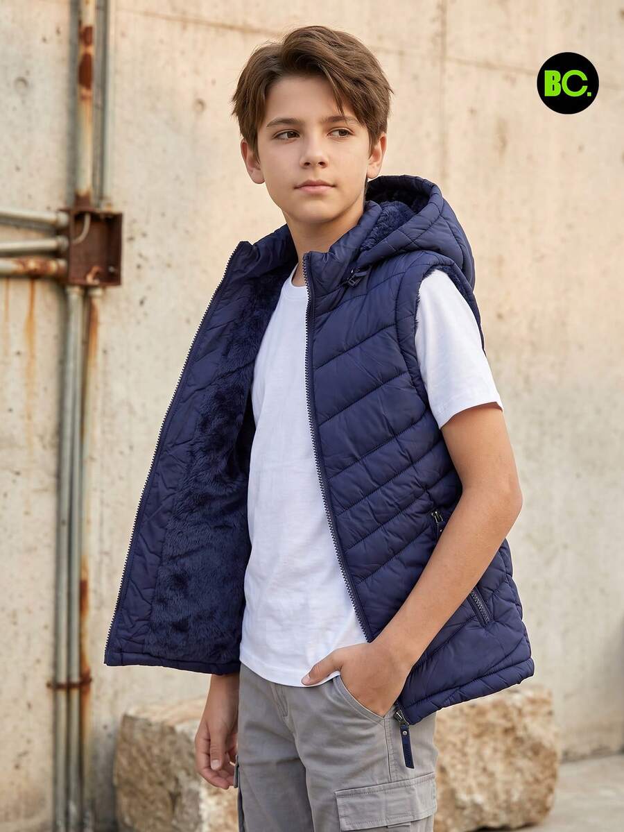 Big City Chaleco acolchado juvenil con capucha, cierre completo y bolsillos laterales. Prenda ligera, cómoda y abrigadora para uso diario, escuela, paseos, otoño e invierno casual y urbano. - Azul Marino - Ver 1