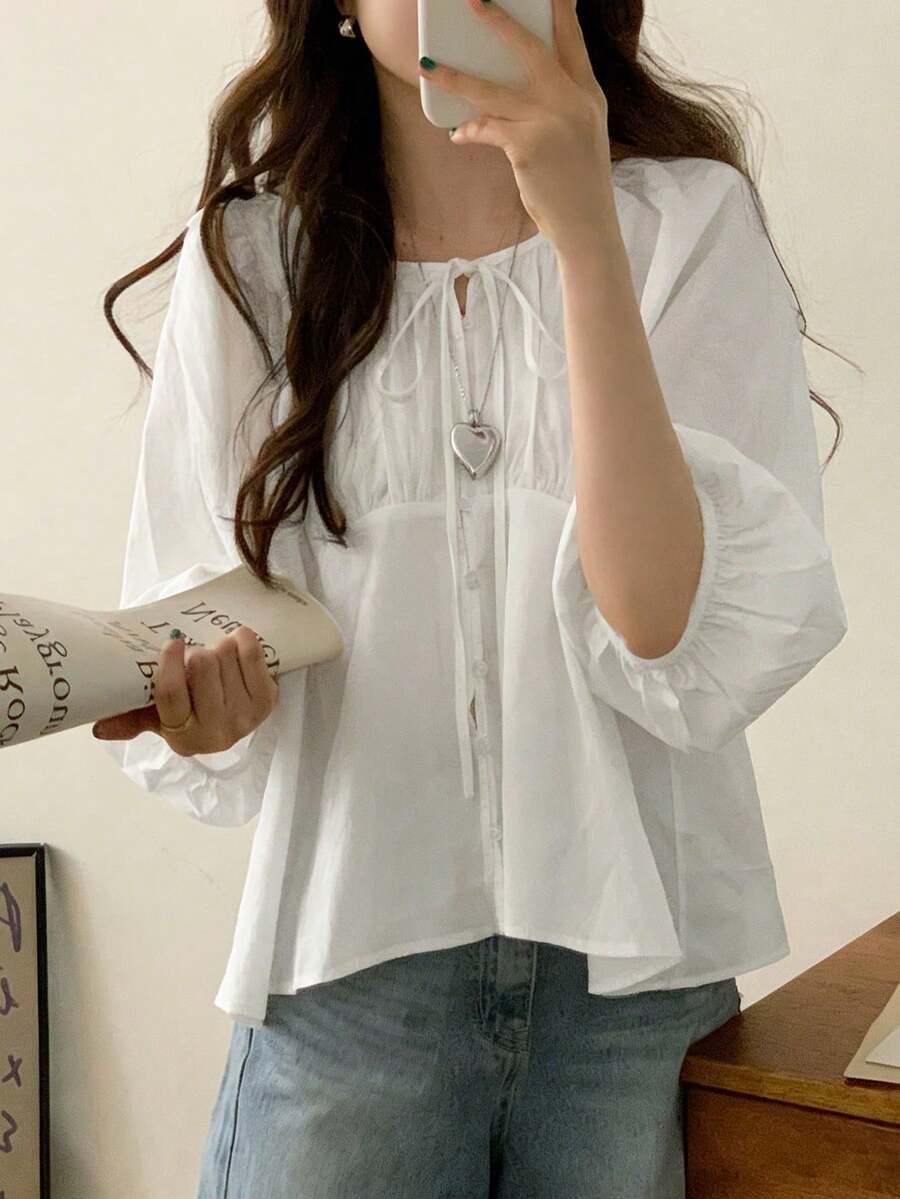 Áo blouse nữ tay dài dáng rộng tôn dáng, cổ tròn đính nơ, cài nút đơn, phong cách độc đáo, dễ phối đồ - trắng - Xem 1
