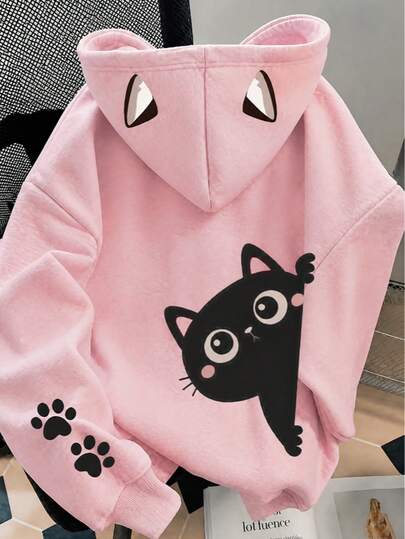 1 pieza Sudadera con capucha para niña preadolescente, rosa dulce, forrada de felpa suave, diseño de orejas de gato 3D con estampado de gato negro asomándose, patrón adorable de patas de gato en los puños, top holgado y suelto de estilo oversized, atuendo anime kidcore lindo, ropa casual diaria para el campus