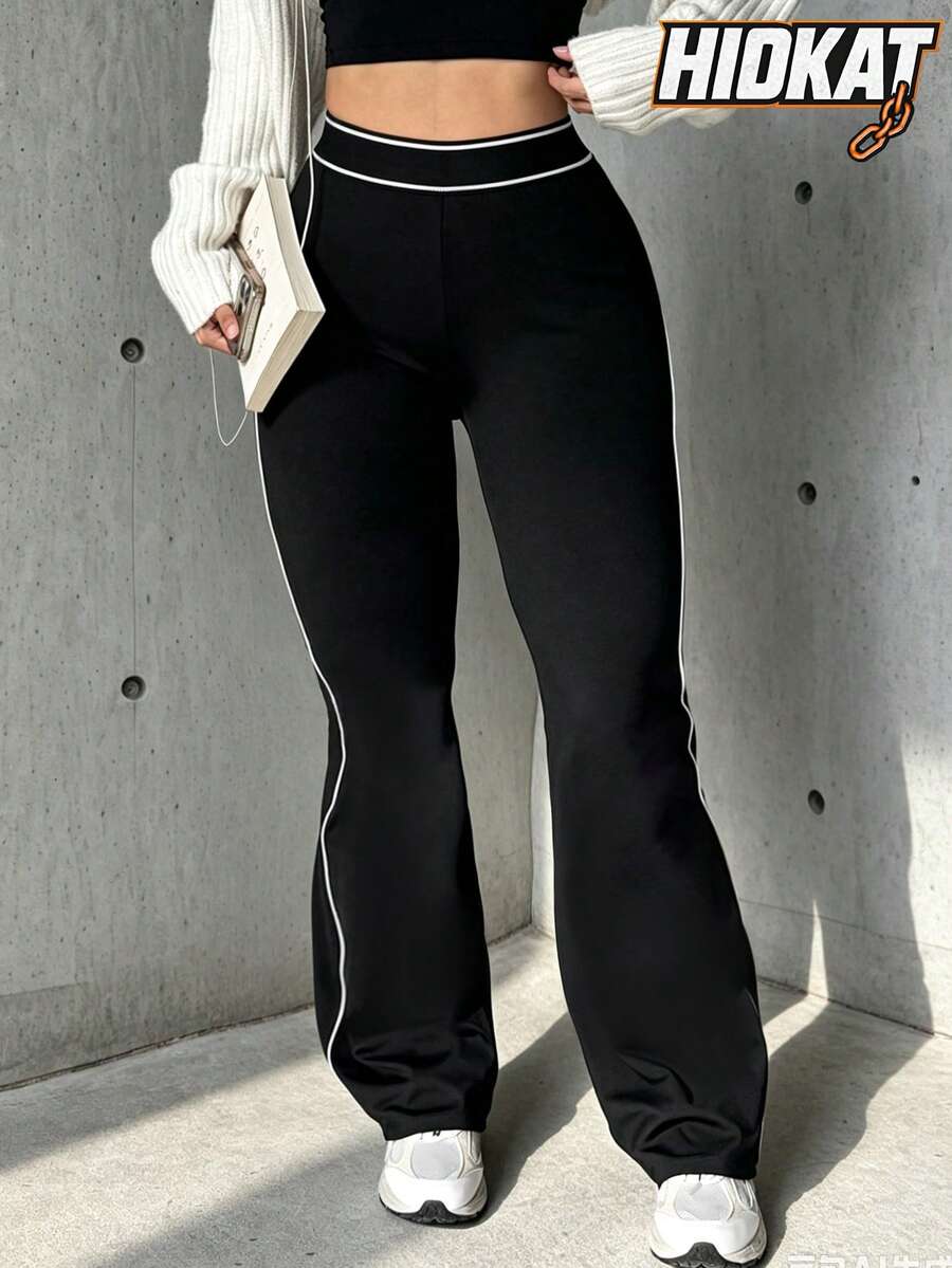 Leggings acampanados de punto de cintura alta con banda elástica y ajuste ceñido en color liso para mujer - Negro - Ver 1
