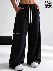mulinsen Women's Sports Sweatpants, Vertical Textured Drawstring Loose Fit, Fitness Running Casual Everyday - Black - View 1