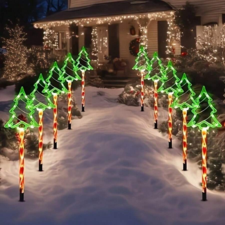 Đèn cắm cây thông Noel năng lượng mặt trời, bộ 5 cái, thiết kế cây thông rỗng trong suốt với cột đèn trang trí xoắn màu đỏ nâu, tinh tế và dễ thương, ánh sáng chạy dọc theo đường viền cây khi thắp sáng, tạo không khí Giáng sinh đậm nét, tự động thu ánh sáng mặt trời và lưu trữ năng lượng ban ngày, cảm biến ánh sáng tích hợp tự động bật ban đêm, không cần đi dây phức tạp