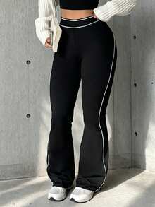 Leggings acampanados de punto de cintura alta con banda elástica y ajuste ceñido en color liso para mujer - Negro - Ver 3