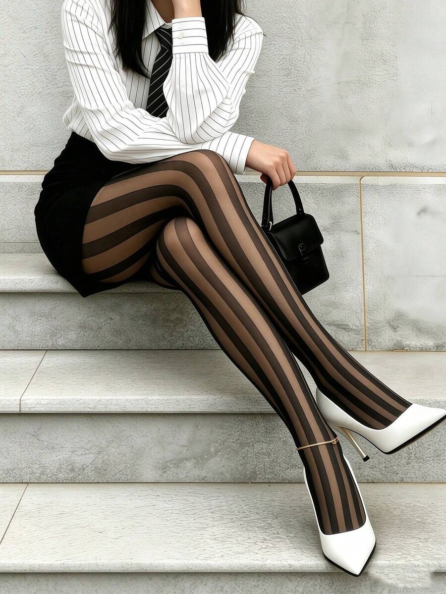 A Pair Of Slim-Fit Trousers Featuring Semi-Sheer Paneling And A Classic Black Design-Suitable For Business Settings And A Variety Of Other Occasions. - Black - View 1