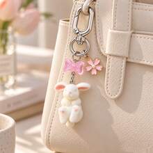 1pc/2pcs Women's Cute Flocked Rabbit Pendant With Transparent Bow Perforated Accessory, Cherry Blossom Charm Keychain, Soft Adorable Bag Charm, Wallet Accessory - Multicolor - View 2