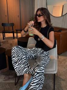2026 New Autumn Zebra Print Women's Long Pants, Elegant Casual Design, Elastic Waistband, No Belt, Versatile Commuter Style - Black and White - View 9